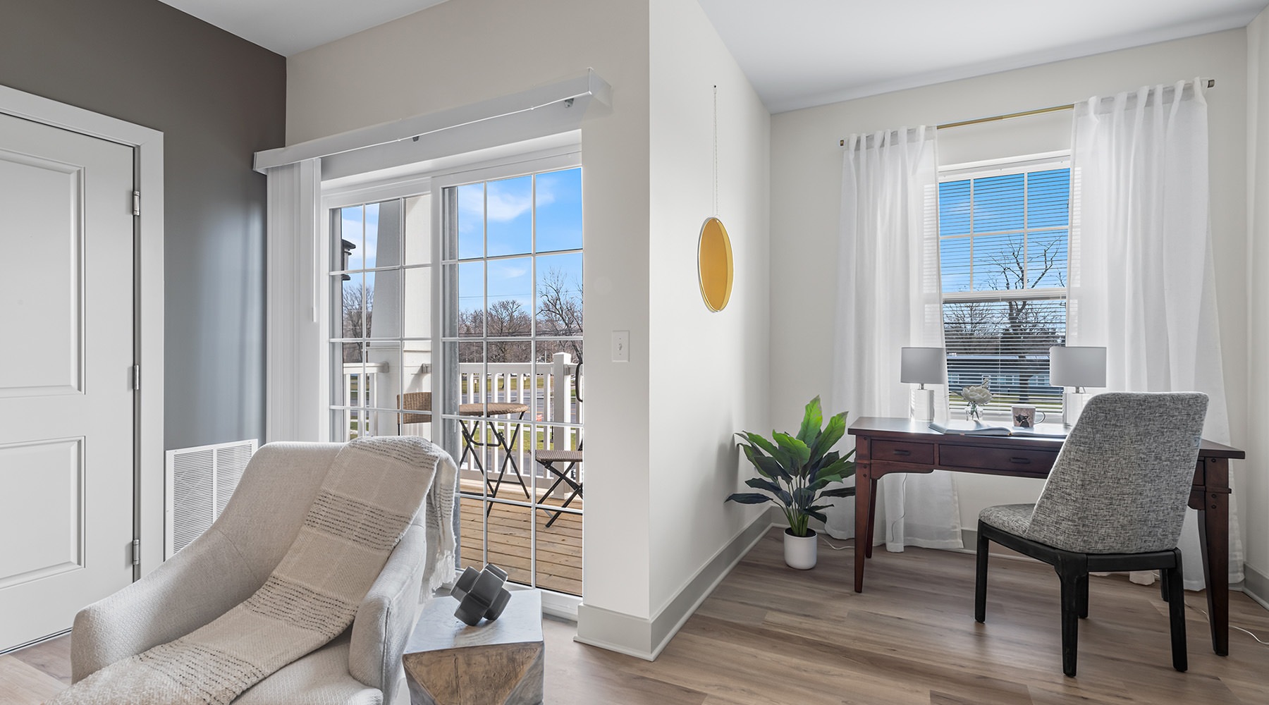 Welcome Home living room with office den with a chair