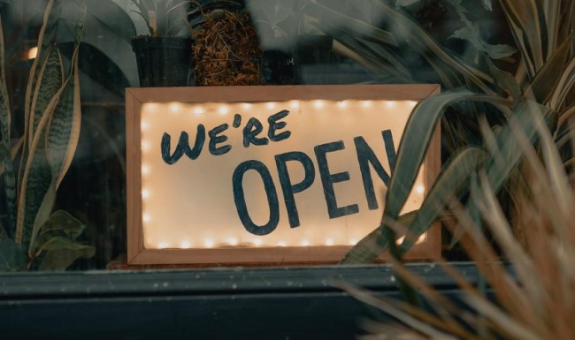 a sign on a glass window